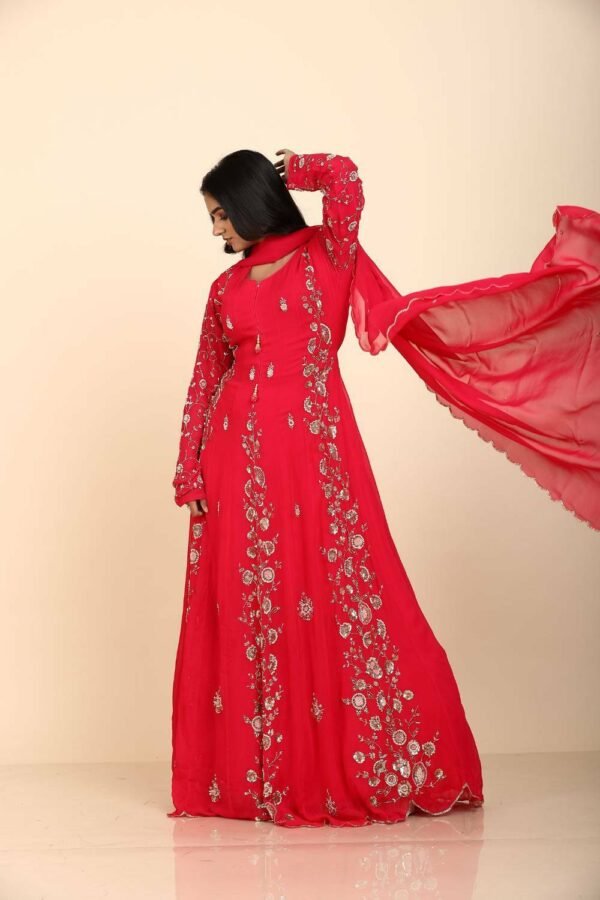 Red Georgette Anarkali with panel design and moti work in a traditional Indian outfit
