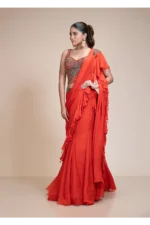 Rust Ruffled Drape Saree with Metallic Aari Work
