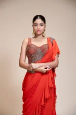 Rust Ruffled Drape Saree with Metallic Aari Work