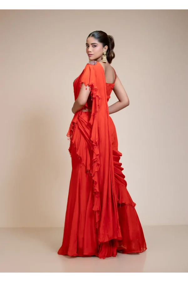 Rust Ruffled Drape Saree with Metallic Aari Work