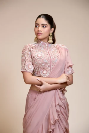 Mauve Ruffled Saree with High Neck Blouse – Elegant Embroidery
