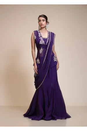 Violet Drape Saree with Embroidered Peplum Top – Beautiful floral embroidery with sequins and a rich violet color for an elegant, festive look.
