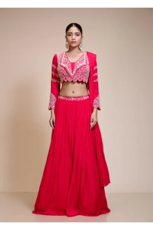 Full-length front view of the Rani Pink Embroidered Lehenga, highlighting the symmetrical, beaded scalloped collar blouse and pleated Chinon skirt.