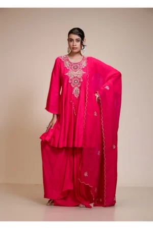 Front view of a rani pink short anarkali set with hand-embroidered neckline, dhoti pants, and a matching dupatta.