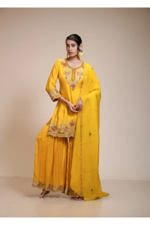 Mustard yellow kurta gharara dupatta set with floral embroidery, round neckline, and organza dupatta