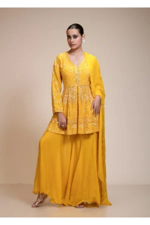 Mustard yellow peplum kurti sharara dupatta set with hand embroidery, V-neckline, full sleeves, and flowing sharara