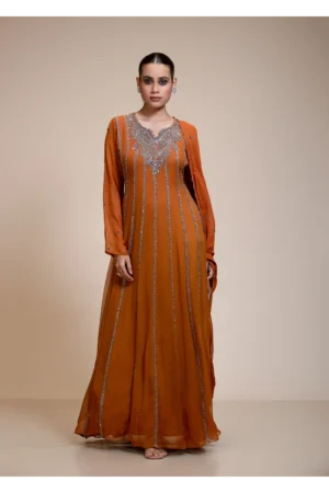 Full front view of a deep rustic orange anarkali gown with silver embellishment, U-neckline, full sleeves, and matching dupatta.