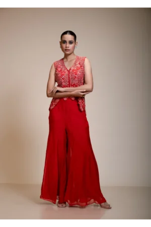 Close-up of the Rust Orange Crop Top Set sleeveless top, highlighting the plunging V-neckline and dense scalloped beadwork.