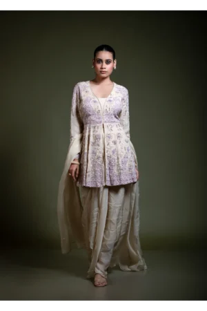 Champagne peplum top with dhoti skirt and dupatta in organza with lavender floral embroidery, deep V-neck, full front view