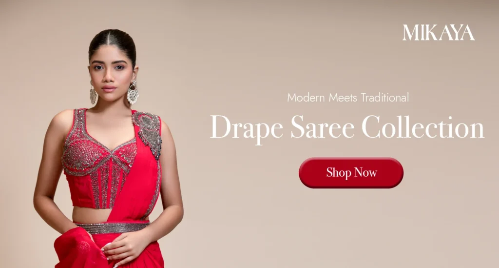 Woman wearing a red embroidered drape saree from Mikaya's designer drape saree collection, perfect for weddings, receptions, parties and festive occasions.